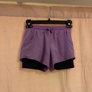 cute purple shorts with navy bicker shorts under
